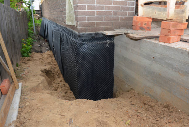 Happy homeowners after waterproofing job in Furlong